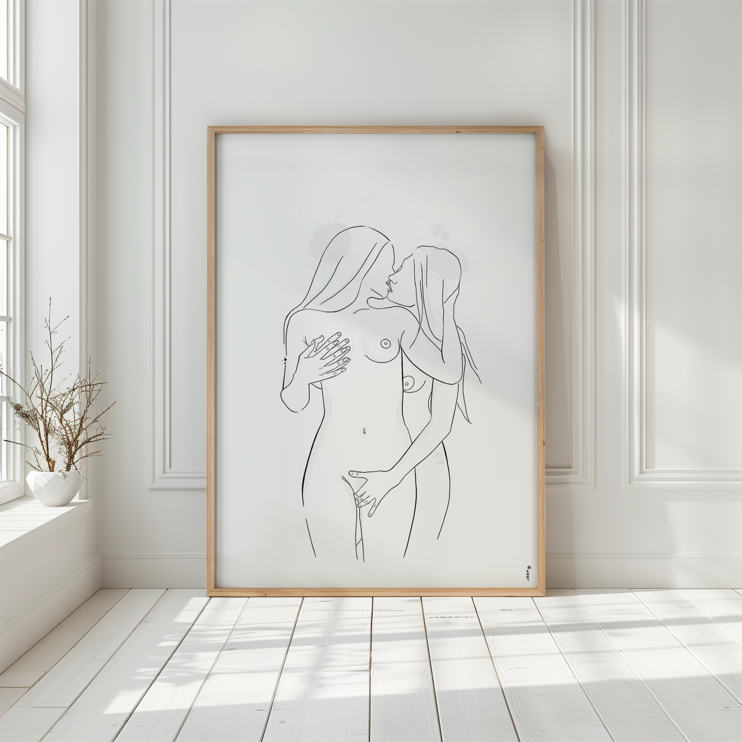 Mockup displaying erotic art of 2 nude women, in natural wooden frame on white floor